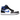 Air Jordan 1 Mid White Black Racer Blue sneakers i vinklet profil med hvide læderpaneler, sorte detaljer og blå Swoosh logo og ydersål