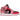 Air Jordan 1 Mid Coral Chalk sneakers set fra siden med lyserøde og sorte læderpaneler samt klassisk hvid mellemsål og sort Swoosh-logo