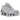 Nike Shox TL Chrome sneakers i en vinklet visning med skinnende krom-finish, markant sort burstruktur og den karakteristiske stødabsorberende Shox-sål