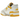 New Balance 550 White Sea Salt Varsity Gold sneakers i en vinklet profilvisning med hvide læderpaneler, gule detaljer og en robust gummisål
