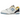 New Balance 550 Marquette sneakers i en flot vinklet profilvisning med marineblå detaljer, gyldenbrune accenter og en klassisk hvid læderoverdel