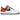 Nike Air Force 1 Low Raygun sneakers i en angled view, der viser den hvide læderoverdel med sorte, orange og gule accenter samt broderet detalje.