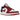 Air Jordan 1 Low Reverse Black Toe sneakers i profilvisning med hvidt læder, røde hælpaneler, sort swoosh og hvide snørebånd