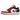Air Jordan 1 Low Reverse Black Toe sneakers i sideprofil med hvid læderbase, røde detaljer ved hælen og ikonisk sort swoosh