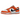 Nike Dunk Low Patent Halloween sneakers set fra siden med skinnende sort og orange laklæder, orange swoosh og en matchende orange gummisål