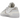 Nike Blazer Low sacai White Patent Leather sneakers i en sideprofil med blankt hvidt læder, dobbelt tunge og synlige skumkanter ved kraven