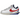 Nike Zoom Cortez SP sacai White University Red Blue sneakers i en vinklet profilvisning med hvid overdel, røde detaljer og blå snørebånd