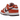 Nike Dunk Low Bronze Eclipse sneakers i en skrå vinkel, viser de brune læderpaneler, en hvid mellemsål og den ikoniske Nike Swoosh detalje.
