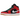 Air Jordan 1 Mid SE Christmas sneakers i en vinklet profilvisning med sorte og grønne paneler, røde detaljer samt en hvid sål