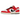 Nike Dunk Low Chicago Split sneakers set fra siden med rød og hvid læderoverdel, delt sort Swoosh-logo og en hvid mellemsål med rød ydersål