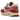 Nike Air Max 1 Red Stardust sneakers i vinklet profil med synlig Air-enhed, beige overdel, hvid mellemsål og lyserøde detaljer