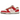 Nike Dunk Low PRM Bacon sneakers i en vinklet visning med lyserøde ruskindsoverlays, hvide læderpaneler og en mørkerød Swoosh-detalje