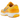 Nike Zoom Vomero 5 Yellow Ochre sneakers i vinklet profil med sennepsgul overdel, cremefarvet mellemsål og grå detaljer på hælen