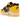 Nike Air Max 1 CO.JP Michigan Head to Head sneakers set fra siden med marineblåt ruskind, gul læderoverdel og hvid mellemsål med synlig Air unit