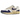 Nike Air Max 1 Athletic Department Deep Royal Blue sneakers set fra siden med hvid overdel, blå læderdetaljer og synlig Air-enhed i sålen.