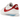 Nike Classic Cortez Forrest Gump sneakers i en angled profil med hvid læderoverdel, rød Swoosh og den ikoniske stribede mellemsål i blå og rød